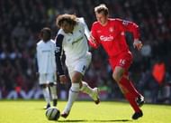 LIVERPOOL, UNITED KINGDOM - APRIL 09:  (L-R) Ivan Campo of Bolton Wanderers holds off Dietmar Hamann of Liverpool during the Barclays Premiership match between Liverpool and Bolton Wanderers at Anfield on April 9, 2006 in Liverpool, England.  (Photo by Laurence Griffiths/Getty Images)